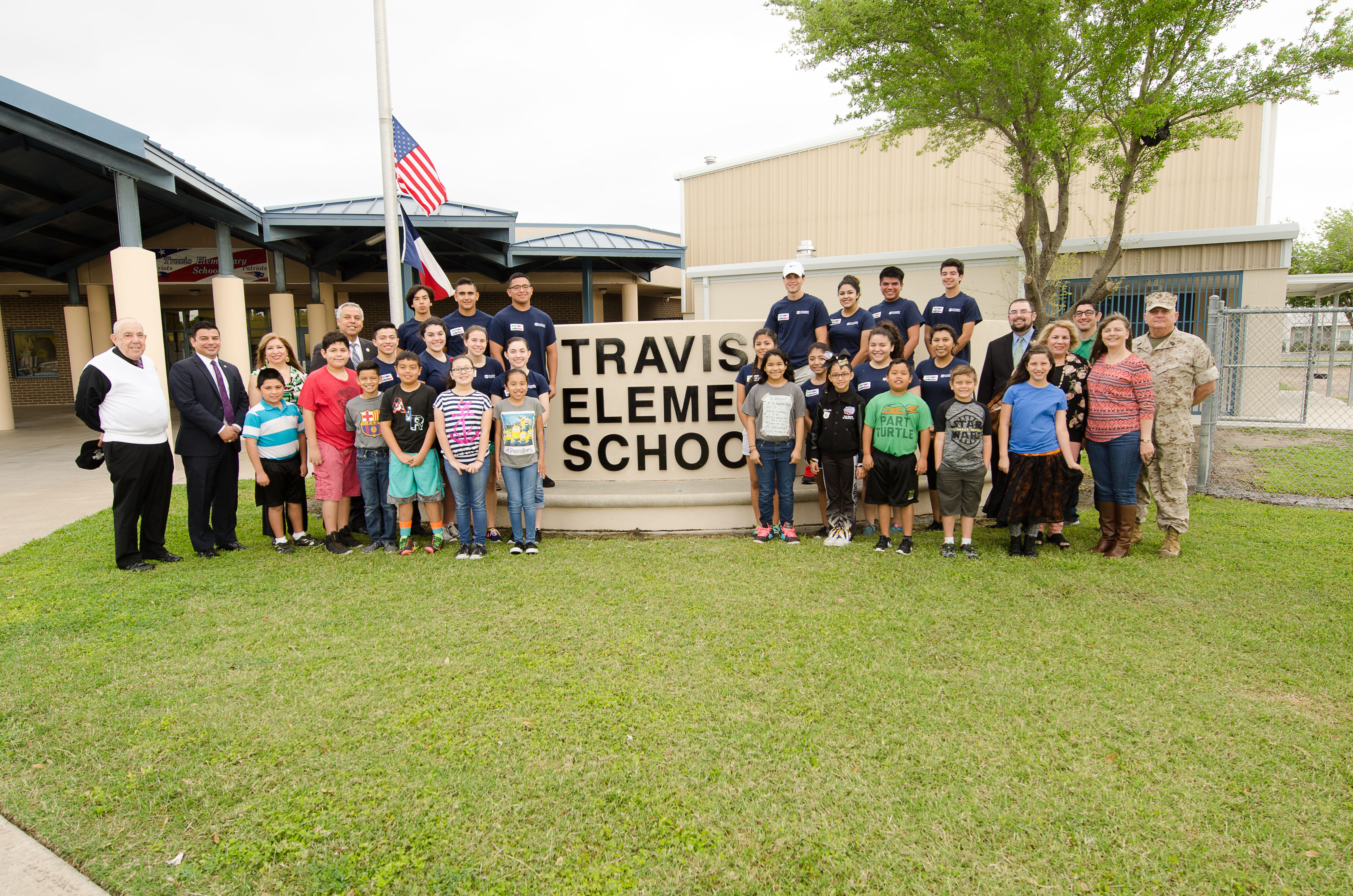 Student Advisory Board and Keep Harlingen Beautiful plant trees at Travis Elementary