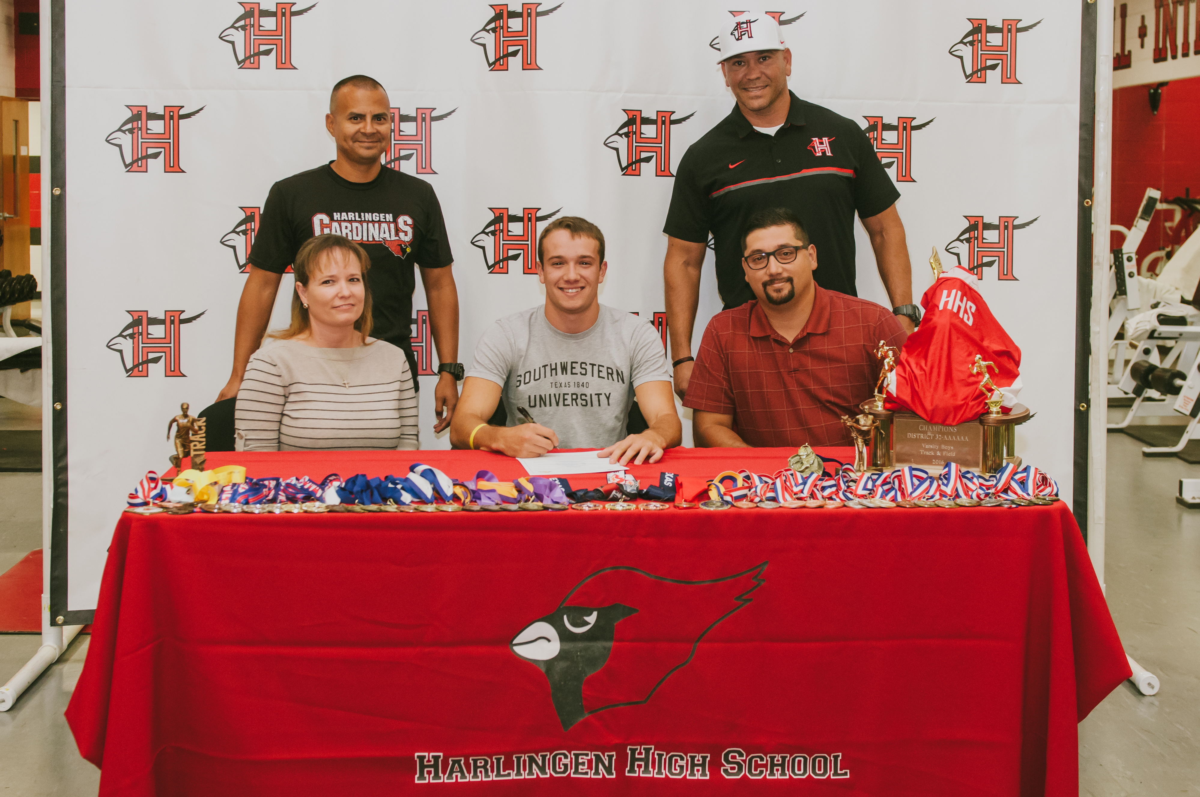 HHS athlete signs letter of intent to run track at Southwestern University